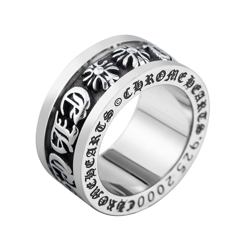 chrome hearts black and gold rotating letter cross flower ring